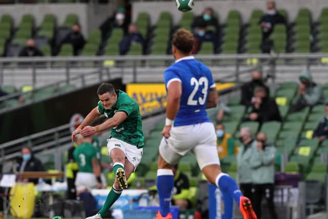 Ireland fly-half Jonathan Sexton converts his team's fourth try during the Six Nations clash against Italy at the Aviva Stadium in Dublin on Saturday.  (Photo by BRIAN LAWLESS/POOL/AFP via Getty Images).