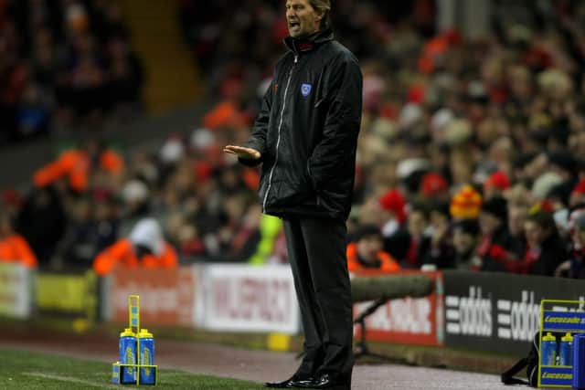 Portsmouth manager Tony Adams makes a point in his first game in charge during the Premier League Match against Liverpool at Anfield on October 29, 2008.  (Photo by Stu Forster/Getty Images).