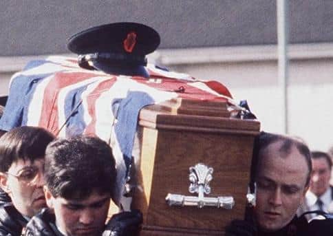 An RUC funeral. As the violence increased, to the question of government representation at funerals became an issue