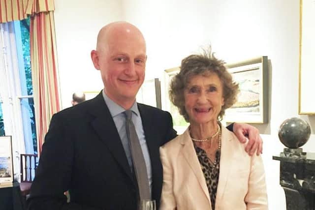 The journalist Harry Mount with his godmother Lindy Guinness (Marchioness of Dufferin and Ava) in 2016. It was taken at her London house to celebrate an exhibition of her Clandeboye landscape paintings, a biography of the 1st Marquess (by Andrew Gailey) and a book by Harry (Odyssey)