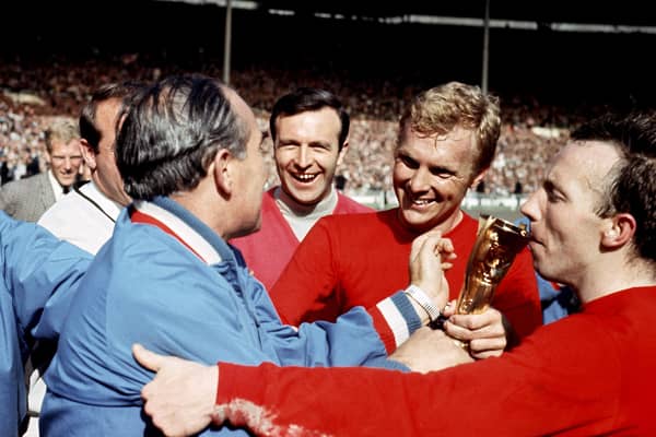 Nobby Stiles kisses the World Cup trophy in 1966. Pic by PA.