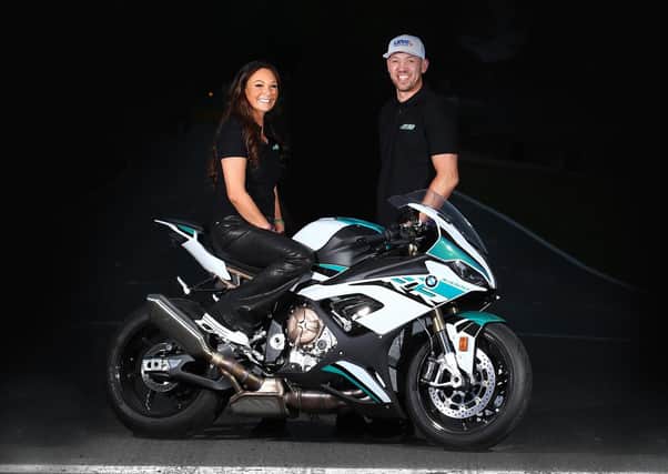Peter Hickman and FHO Racing team owner Faye Ho.