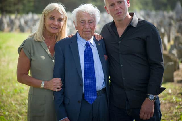 Angela Cohen (Robert Rinder's mother), Leon Rytz (last survivor of Treblinka death camp) and Robert Rinder at Treblinka (former NAZI death camp) in Poland