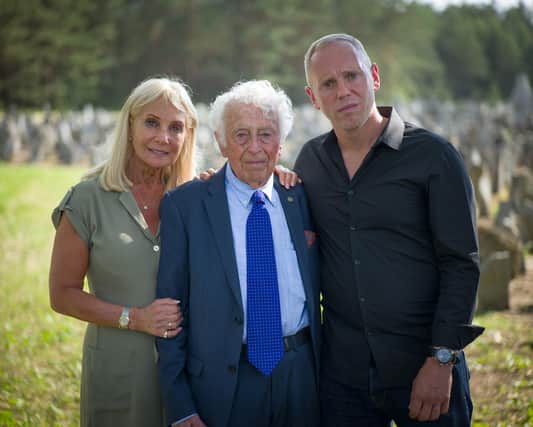 Angela Cohen (Robert Rinder's mother), Leon Rytz (last survivor of Treblinka death camp) and Robert Rinder at Treblinka (former NAZI death camp) in Poland
