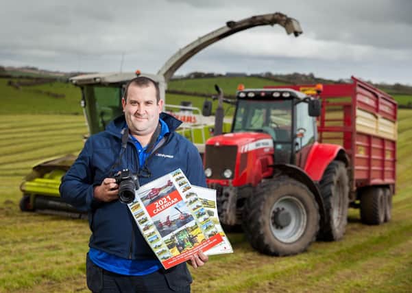 Steven Evans from Kirkistown, with a 2021 Calendar showcasing his photography of agricultural contractors operating around the Ards Peninsula, the sales of which will be donated in full, to the Air Ambulance NI.
