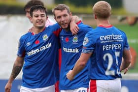 Kirk Millar (centre) finished with a goal and assist for Linfield against Portadown. Pic by Pacemaker.