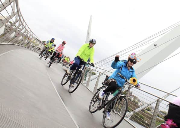 Cyclists under guidance from Cycling Made Easy’s Monica Downey, making their way through the Peace Bridge