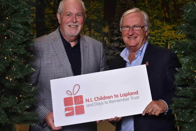 Gerry Kelly, president of The Northern Ireland Children to Lapland and Days to Remember Trust and Colin Barkley, the charity's  chair.