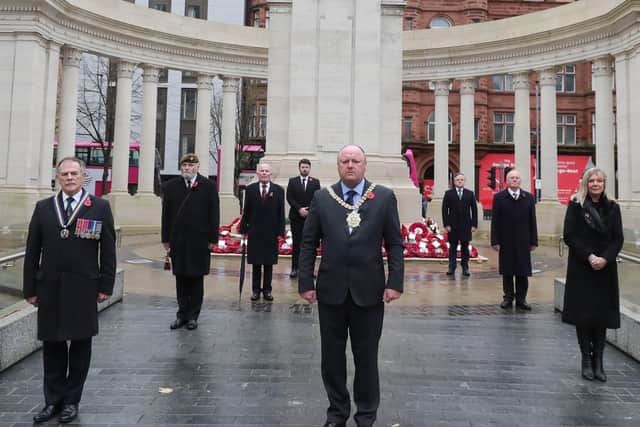 The President of the Royal British Legion Major Philip Morrison MBE, Lord Mayor of Belfast Alderman Frank McCoubrey  and The Chief Executive Belfast City Council Mrs Suzanne Wylie at the Cenotaph in the Garden of Remembrance at City Hall.

Photo: Kelvin Boyes / Press Eye.