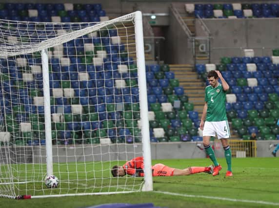 Bailey Peacock-Farrell and Tom Flanagan are dejected after Slovakia's late winner. Pic Stephen Davison/Pacemaker