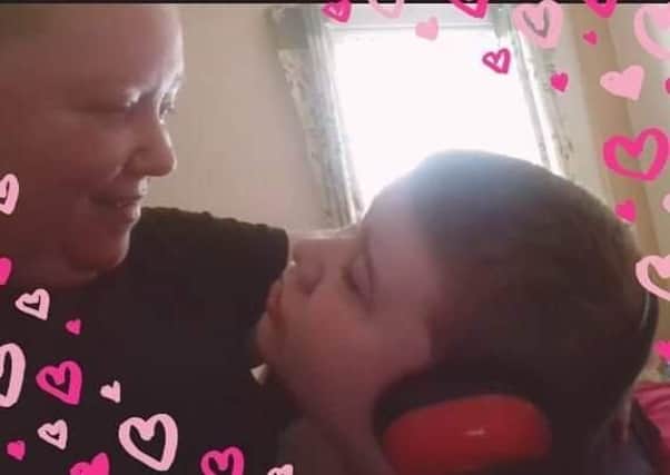 Daphney Scott and her autistic son Nathan