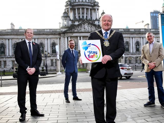 With Lord Mayor of Belfast Alderman Frank McCoubrey is Junior Minister Gordon Lyons, Simon Hamilton, Chief Executive Belfast Chamber, and Junior Minister Declan Kearney as they encourage people to shop safely and support local retailers in the run up to Christmas