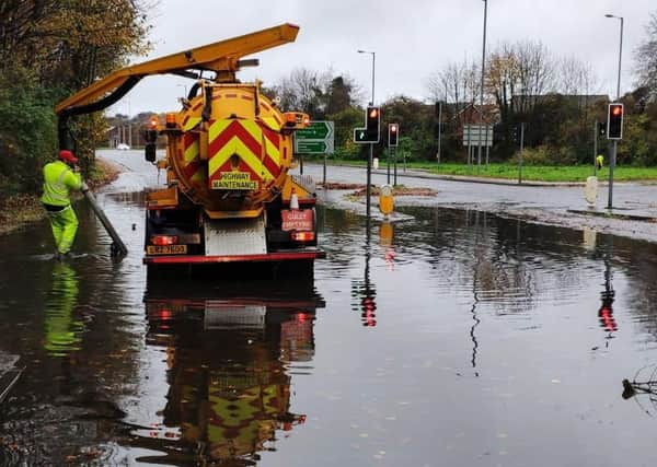 Press Eye - Belfast - Northern Ireland - 15th November 2020 - 

Department for Infrastructure Roads Service engineers clear the Hospital Road near Shaws Bridge in Belfast after heavy rain flooded several locations across Northern Ireland. 

Photo by Press Eye.