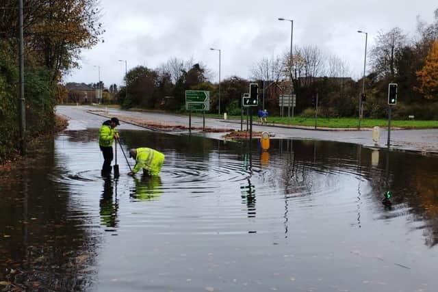 Press Eye - Belfast - Northern Ireland - 15th November 2020 - 

Department for Infrastructure Roads Service engineers clear the Hospital Road near Shaws Bridge in Belfast after heavy rain flooded several locations across Northern Ireland. 

Photo by Press Eye.
