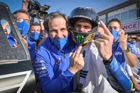 Joan Mir and Suzuki team manager Davide Brivio celebrate winning the 2020 MotoGP World Championship.