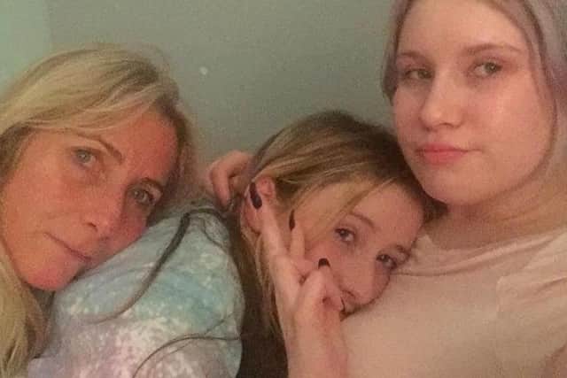 Amber with her mum Daniella and sister Charlotte