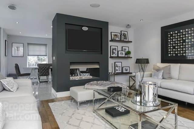 There are three spacious reception rooms including drawing room, living room and sunroom