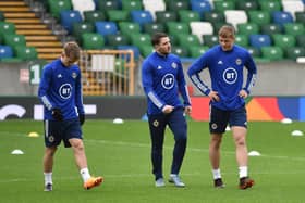 Northern Ireland's Ethan Galbraith , Conor Washington and Daniel Ballard during  a training session at The National football stadium at Windsor Park on Tuesday.