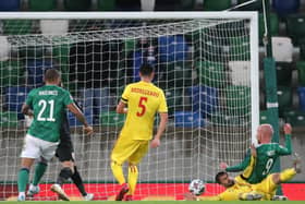 Northern Ireland's Liam Boyce (right) scores against Romania in the Nations League. Pic by PA.