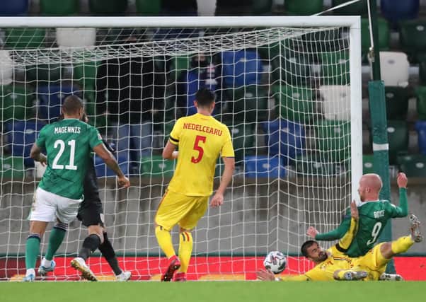 Northern Ireland's Liam Boyce (right) scores against Romania in the Nations League. Pic by PA.