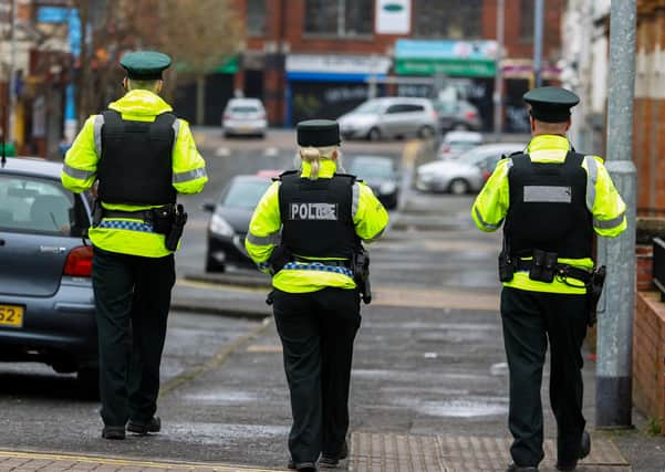 PSNI officers patrol in Belfast