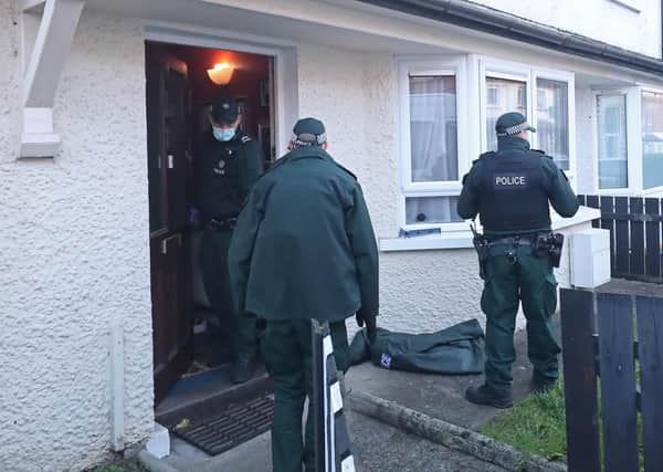 Police search a house in south Belfast this week