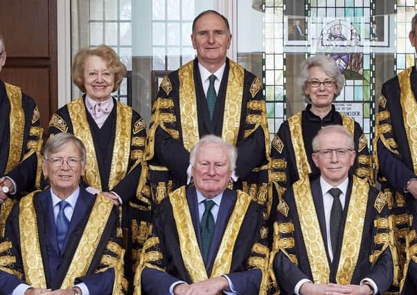 Lord Kerr, the former lord chief justice of Northern Ireland, pictured earlier this year seated centre with other Supreme Court colleagues, said: "It is for the state to decide, in light of the incapacity of Sir Desmond de Silva’s review and the inquiries which preceded it to meet the procedural requirement of article 2, what form of investigation, if indeed any is now feasible"