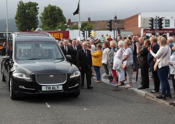 PACEMAKER, BELFAST, 26/6/2020: A guard of honour flanks the hearse carrying the body of leading republican Bobby Storey to his Anderonstown home in Belfast.
 PICTURE BY STEPHEN DAVISON