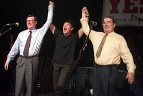 19/05/98: David Trimble, U2 frontman Bono, and John Hume on stage at the Waterfront Hall in Belfast to promote a YES vote in the referendum