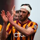 Rory McArdle of Bradford applauds the fans after victory in the FA Cup Fifth Round match between Bradford City and Sunderland at Coral Windows Stadium, Valley Parade on February 15, 2015.  (Photo by Laurence Griffiths/Getty Images).