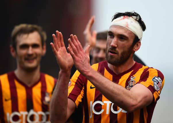 Rory McArdle of Bradford applauds the fans after victory in the FA Cup Fifth Round match between Bradford City and Sunderland at Coral Windows Stadium, Valley Parade on February 15, 2015.  (Photo by Laurence Griffiths/Getty Images).