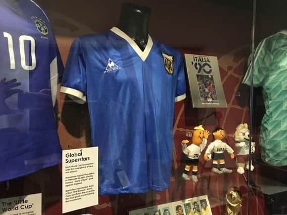 The shirt Diego Maradona wore when he played England in 1986 on display at the National Football Museum in Manchester, It was loaned to them for exhibitions in 2003 by former England midfielder Hodge, who swapped shirts with Maradona after the 'Hand of God' World Cup quarter-final in Mexico City 34 years ago.