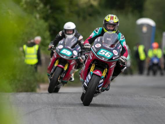 Adam McLean leads his McAdoo Racing team-mate Darryl Tweed in the Supertwin race at the Cookstown 100 in September.