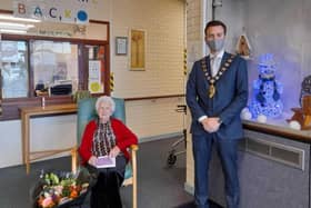 The Mayor, Cllr Peter Johnston, presented Jean with flowers and a card.