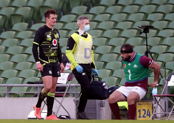 Ireland's Billy Burns goes off injured during the Autumn Nations Cup match at the Aviva Stadium, Dublin.