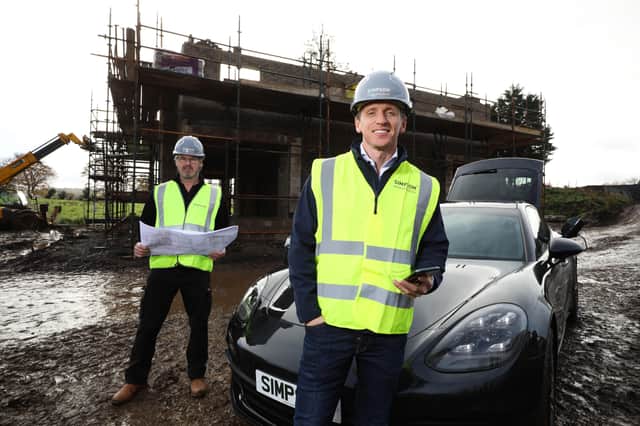 Dunadry Gate Site Manager Clive Backus with Simpson Developments Director David Simpson