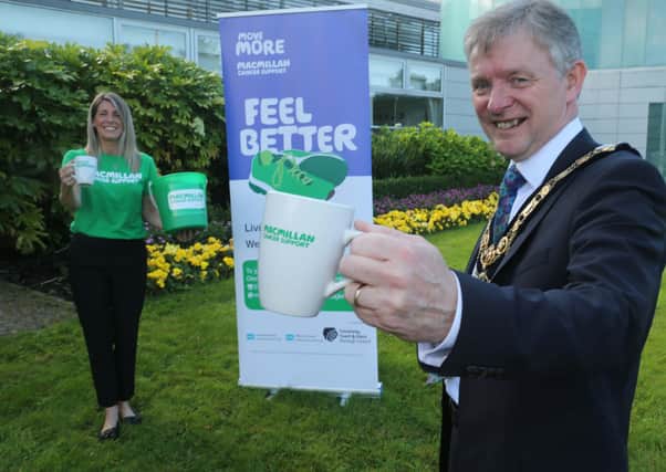 The Mayor of Causeway Coast and Glens Borough Council Alderman Mark Fielding and Move More Co-Ordinator Catherine King pictured at the launch of the World’s Biggest Coffee Morning fundraising initiative