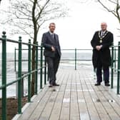 Agriculture, Environment and Rural Affairs Minister Edwin Poots, MLA is pictured with Mayor of Antrim and Newtownabbey, Councillor Jim Montgomery at the new boardwalk at Antrim Lough Shore Park.