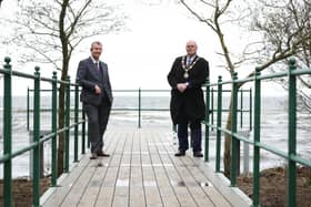 Agriculture, Environment and Rural Affairs Minister Edwin Poots, MLA is pictured with Mayor of Antrim and Newtownabbey, Councillor Jim Montgomery at the new boardwalk at Antrim Lough Shore Park.