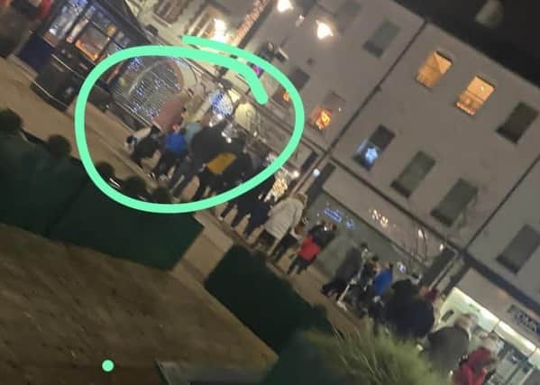 Mr Higginson said members of the public were queuing in non-socially distanced fashion to use the council Christmas light tunnel, which is circled in green.