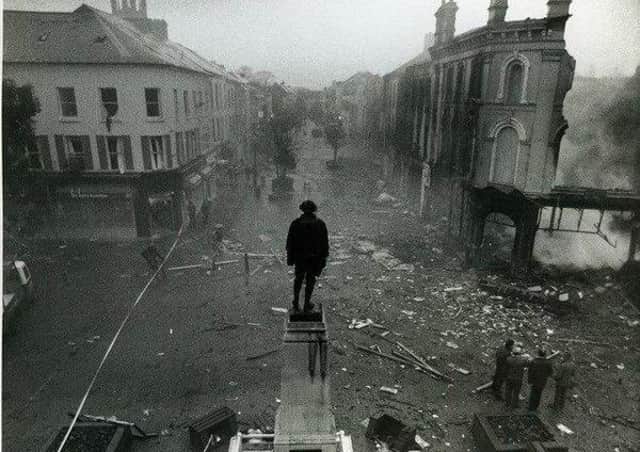 The aftermath of the IRA large van bomb detonated in the centre of Coleraine by the IRA in 1992. No-one was killed in the blast, unlike the 1973 IRA bomb in the town in which six people were murdered. Trevor Ringland says that not only should the 1,423 unsolved Troubles killings lead to a review, but also cases in which people were seriously injured