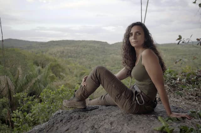 Palaeo-anthropologist Ella Al-Shamahi looks out at the Jungle from a vantage point at Cerro Azul in Guaviare state, Columbia