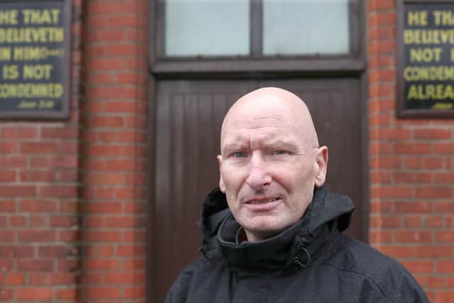 Billy Hutchinson picutred yesterday outside the John White Memorial church on Matchett Street where he was born in the Shankill district of Belfast. Photo: Stephen Davison/Pacemaker