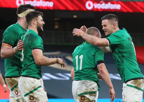 Keith Earls of Ireland celebrates after scoring their first try with Jnhnny Sexton during the Autumn Nations Cup match against Scotland at the Aviva Stadium on Saturday. (Photo by Brian Lawless - Pool/Getty Images).