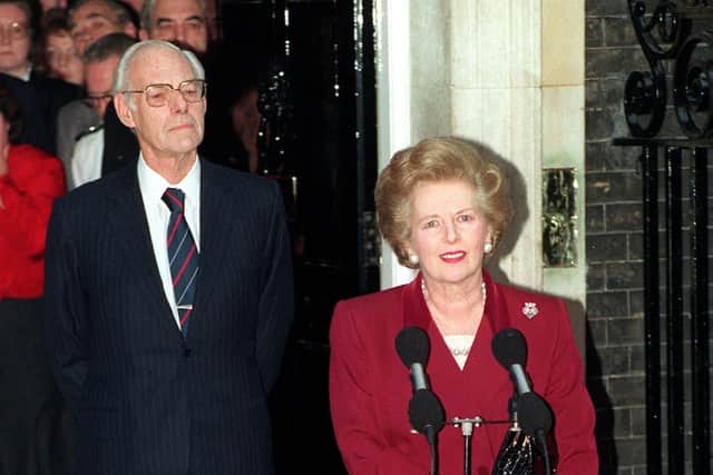 Margaret Thatcher, watched by her husband Dennis, leaves Downing Street for the last time on November 28 1990