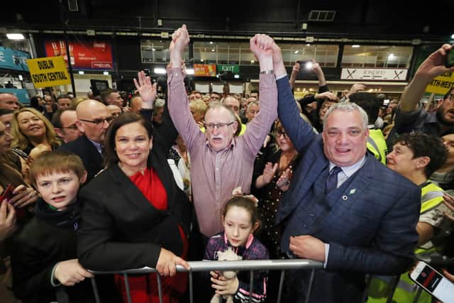 Mary Lou McDonald celebrates Sinn Fein’s Dessie Ellis being re-elected TD earlier this year. The party is twisting historical commemorations to its electoral advantage
