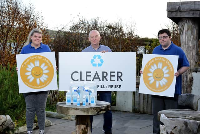 David Hunter, CEO of Access Employment Limited and Co-Founder of Clearer is pictured with employees Nicole Gant and Ryan Spence with the new range of hand sanitiser