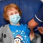 Margaret Keenan, 90, is the first patient in the United Kingdom to receive the Pfizer/BioNtech covid-19 vaccine at University Hospital, Coventry, administered by nurse May Parsons, at the start of the largest ever immunisation programme in the UK's history