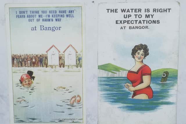 Postcards from the 1920s displayed on the hoardings