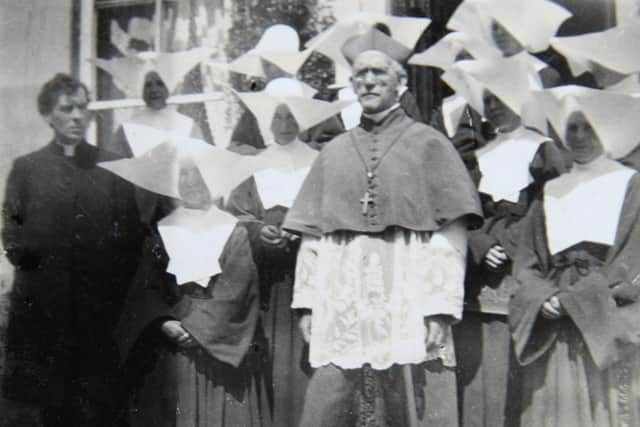 Pictured centre is Dr Daniel Cohalan, Bishop of Cork and Ross, with Sisters of Charity from Kinsale, Co Cork, and the Reverend Patrick MacSwiney CC, MA. Picture: Wikimedia Commons